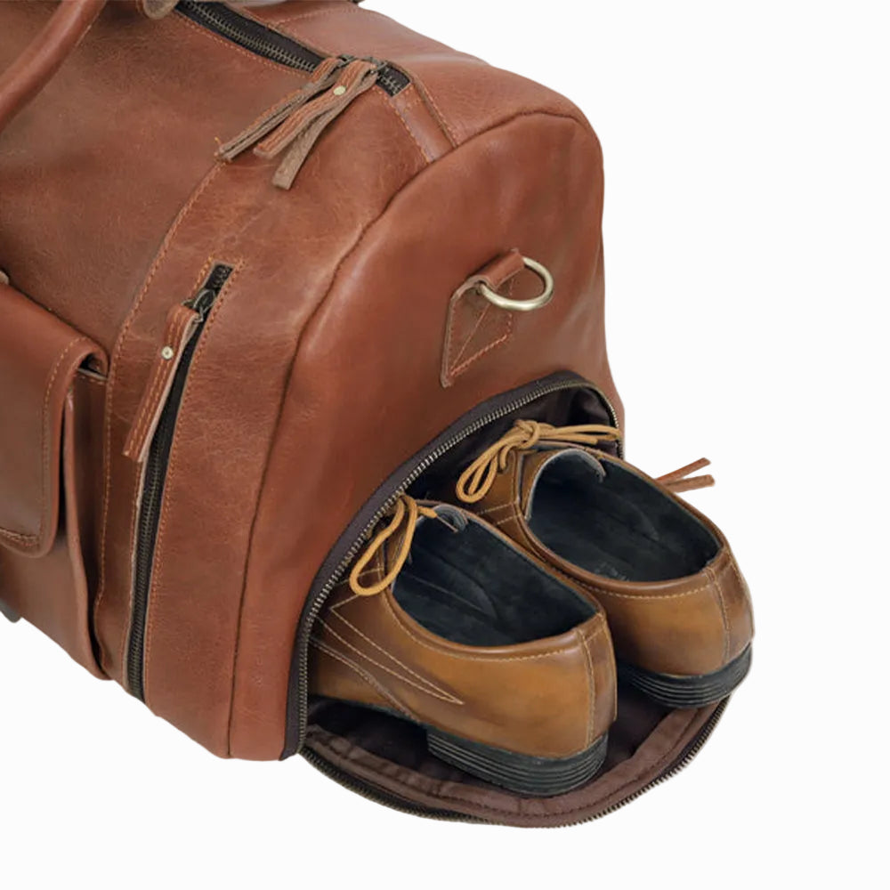 Vintage Brown Leather Duffle Bag with a shoe inside on a white background