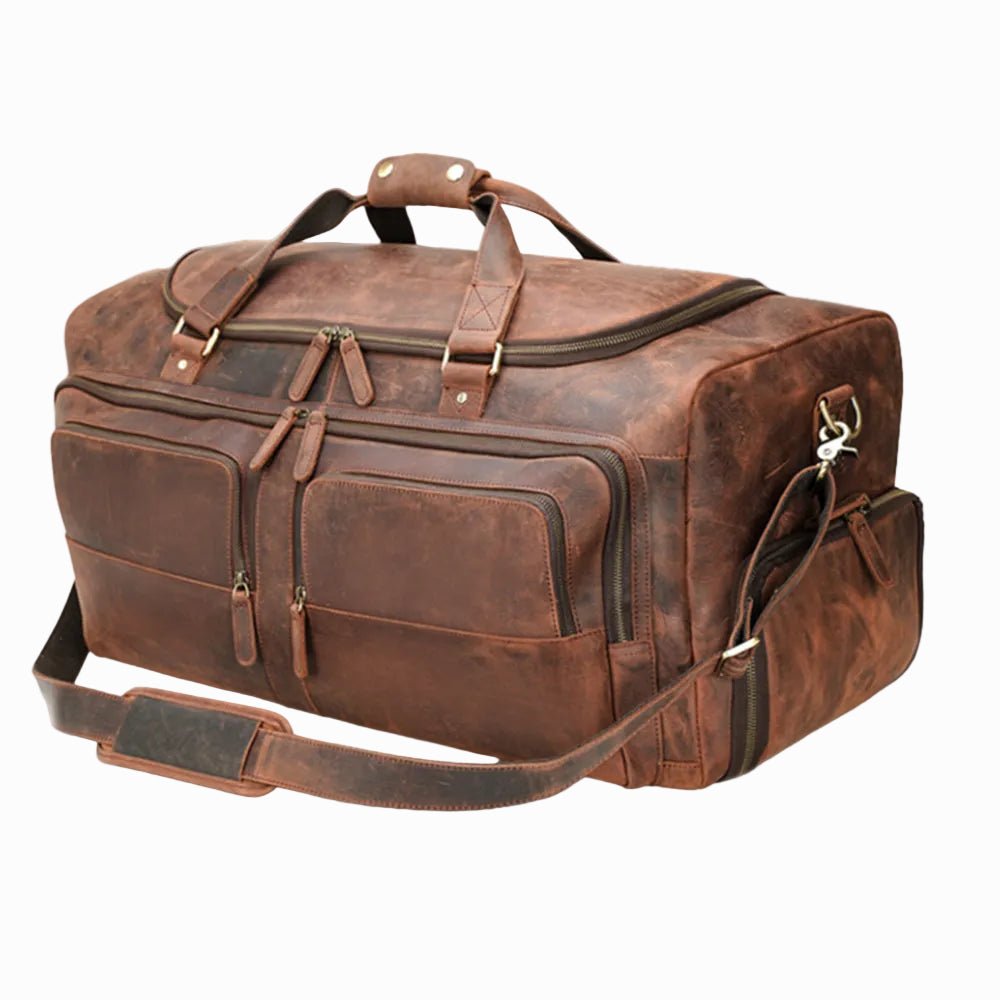 Brown leather vintage duffel bag on a white background