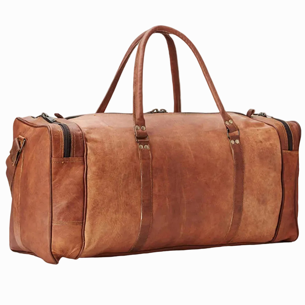 Brown leather travel duffel bag on a white background