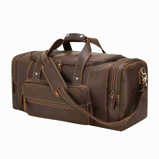 vintage Brown leather duffel bag with shoulder strap on a white background