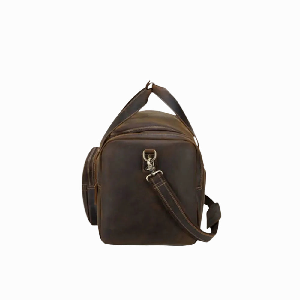 vintage Brown leather travel duffel bag on a white background