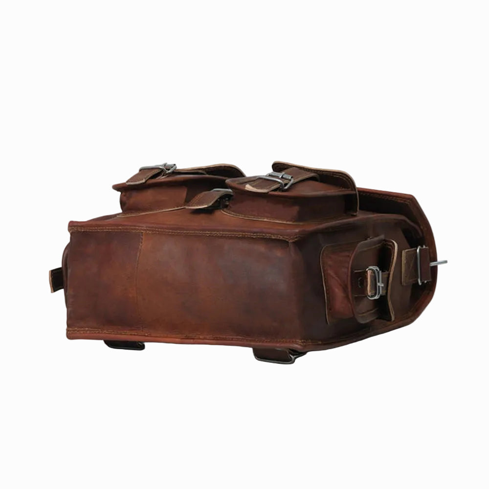 vintage distressed unisex sheepskin Brown leather bag with multiple straps on a white background