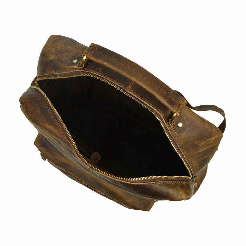 distressed Brown vintage Brown leather duffel bag with gold zipper on a white background