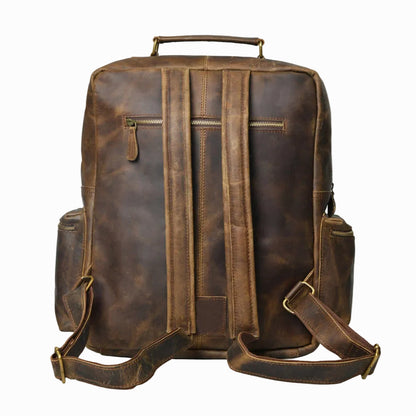back view of distressed Brown vintage Brown leather backpack on a white background