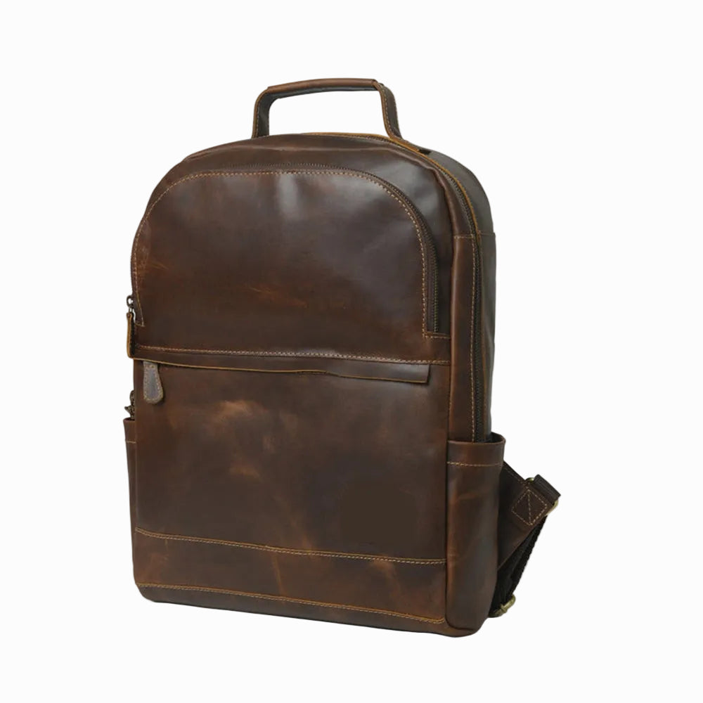 Brown leather backpack on a white background