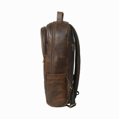 Side view of vintage distressed unisex Brown leather backpack on a white background