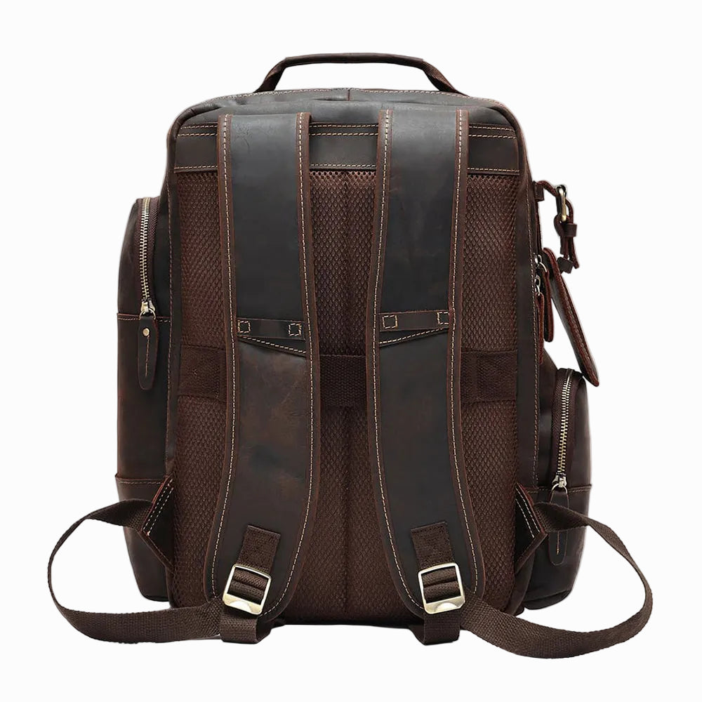 Handmade Brown Sheepskin leather backpack on a light gray background
