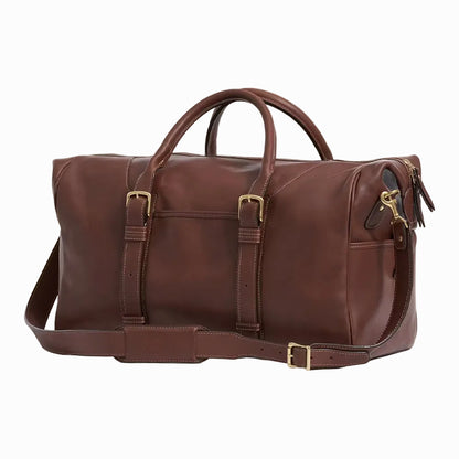 side view of Brown leather travel and gym duffel bag on a plain background