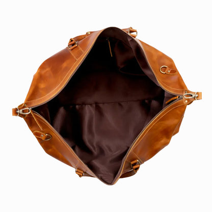 Brown leather bag with open top on a white background
