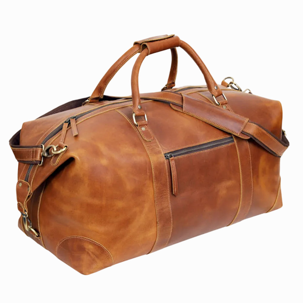 Vintage Brown leather duffel bag on a white background