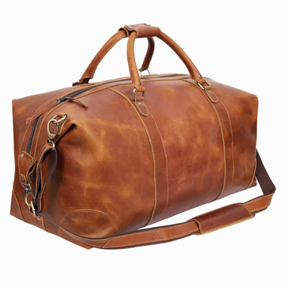 Vintage Brown leather duffel bag on a white background