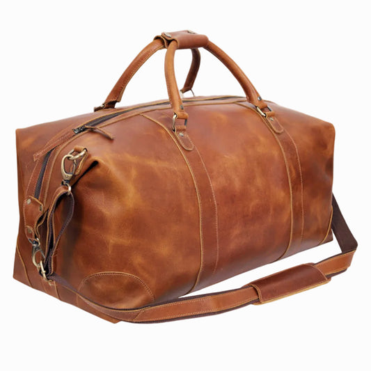 Vintage Brown leather duffel bag on a white background