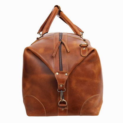 Brown Vintage leather duffel bag with a handle on a white background