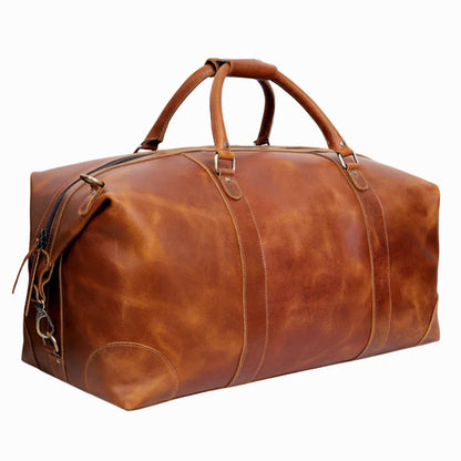 Brown leather duffel vintage bag on a white background