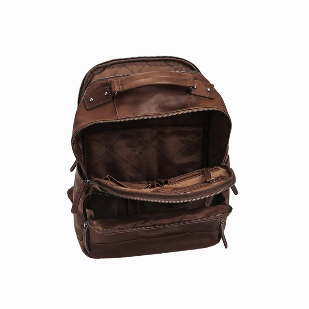 Vintage Handmade Sheepskin Brown leather backpack on a white background