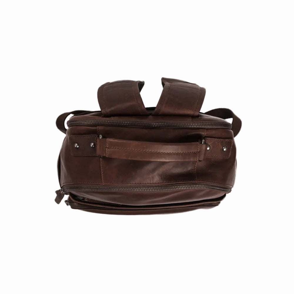 top view of a Vintage Handmade Brown sheepskin leather duffel bag on a white background