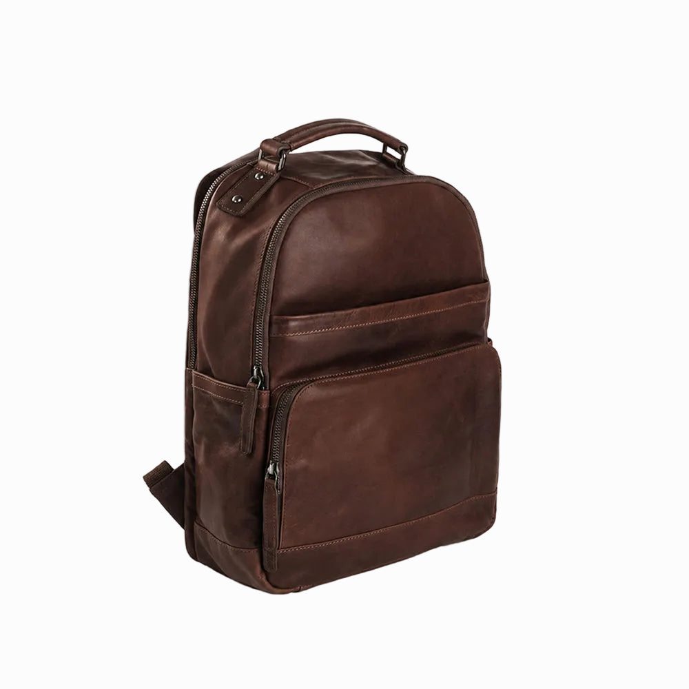 Vintage Handmade Brown leather backpack on a white background