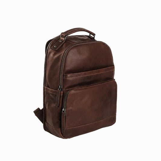 Vintage Handmade Brown leather backpack on a white background